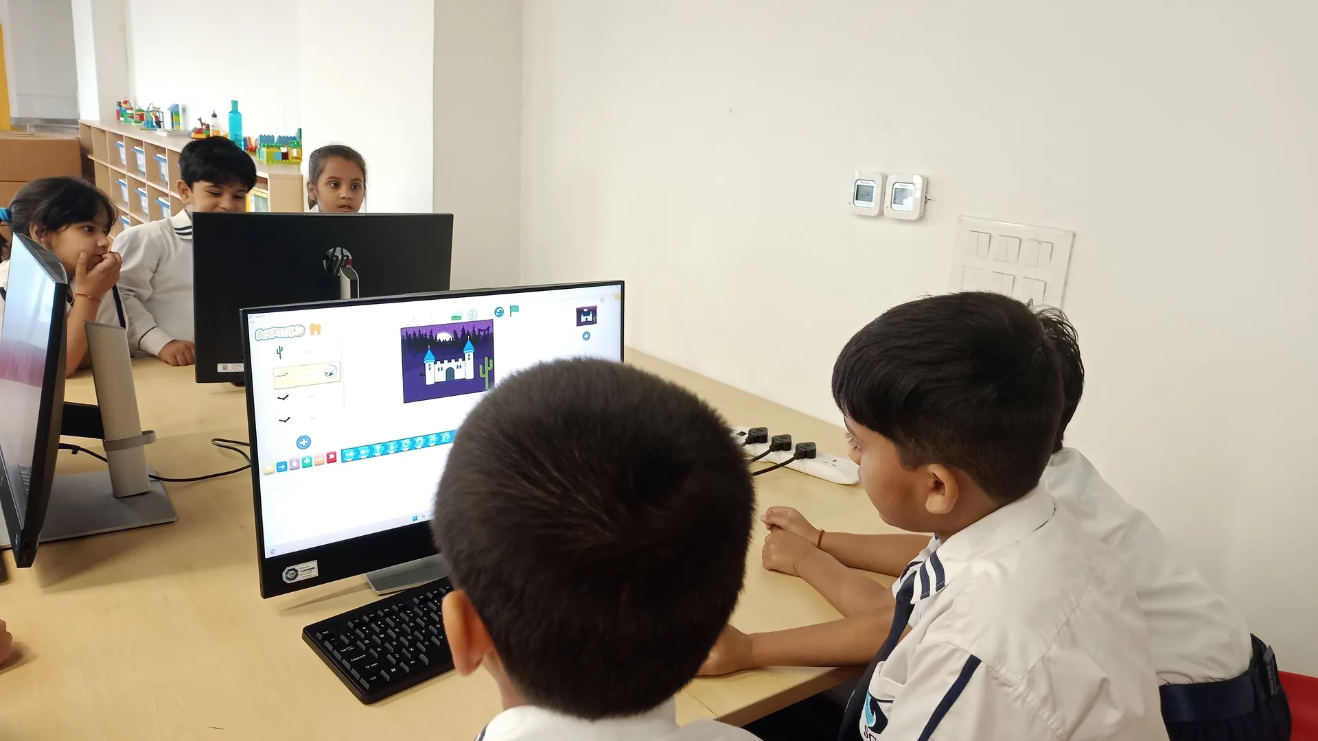 BRAINIAC students working on AI learning activities